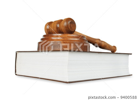 Wood gavel and soundblock on on a thick book Wood gavel and soundblock on on a thick book 9400588