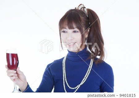 A woman with a wine glass 9401815