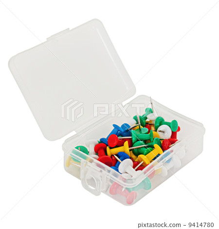 Transparent plastic box with thumbtacks isolated on white backgr Transparent plastic box with thumbtacks isolated on white backgr 9414780