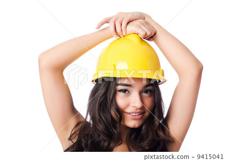 Young woman with hellow hard hat on white 9415041