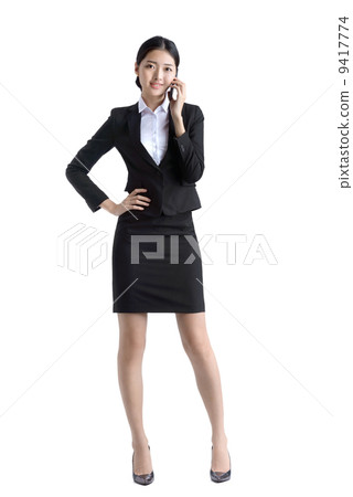 Business woman using mobile phone studio white background Business woman using mobile phone studio white background 9417774