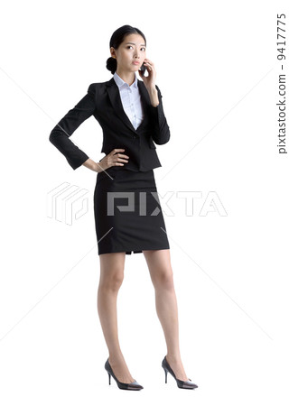 Business woman using mobile phone studio white background 9417775
