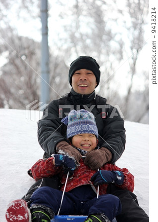 Sled slipping with parent and child Sled slipping with parent and child 9418214