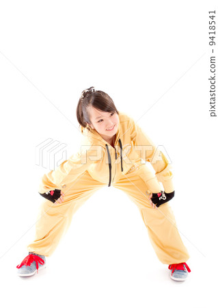 A pretty cheerful girl who dances hip-hop dance A pretty cheerful girl who dances hip-hop dance 9418541