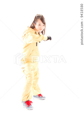 A pretty cheerful girl who dances hip-hop dance 9418580