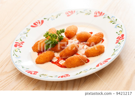 potato balls with sauce potato balls with sauce 9421217