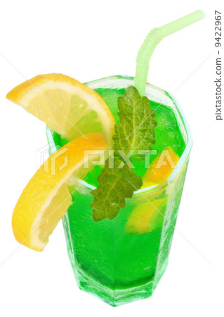 Green cocktail with crushed ice top view Green cocktail with crushed ice top view 9422967