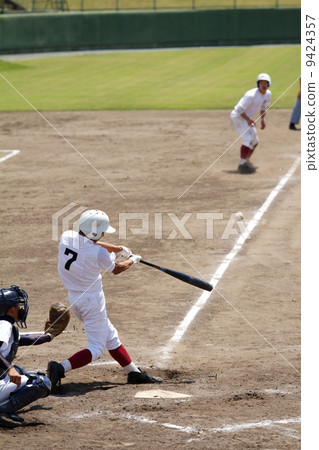 Batter with a long hit in opportunity in high school baseball 9424357