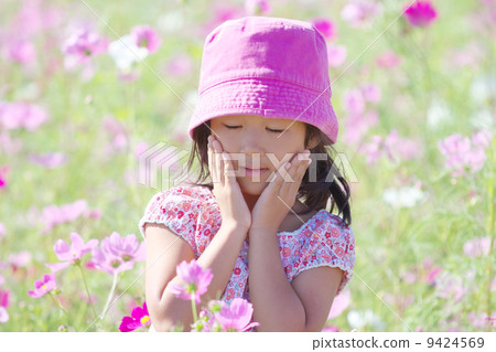 Cosmos field and girl 9424569