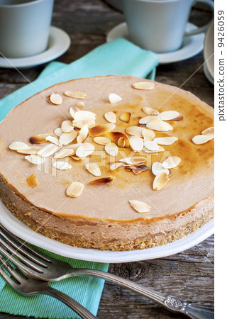 Chocolate Cheesecake with Fried Almond flakes Chocolate Cheesecake with Fried Almond flakes 9426059