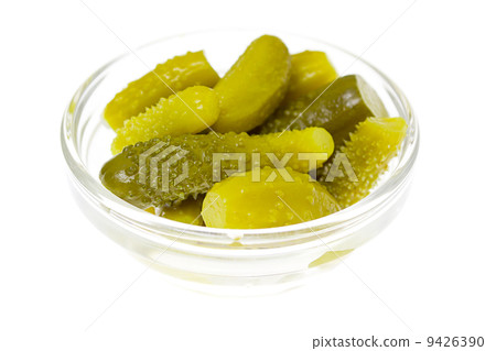Pickled cucumber in glass bowl isolated on white background 9426390