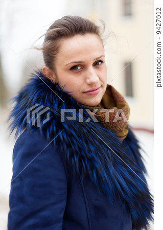 Outdoor winter portrait of quiet woman Outdoor winter portrait of quiet woman 9427012