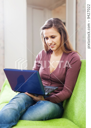 woman with netbook woman with netbook 9427022