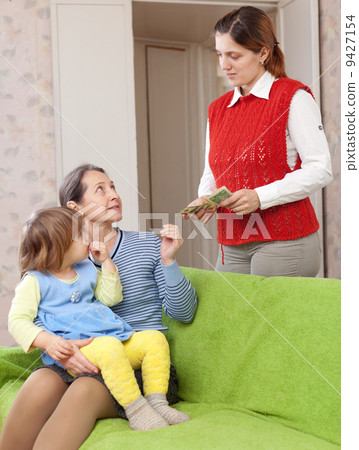 mother leaving baby with nanny 9427154