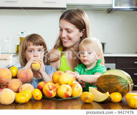 Happy family together with melon Happy family together with melon 9427476