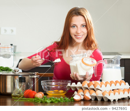 woman making dough 9427691