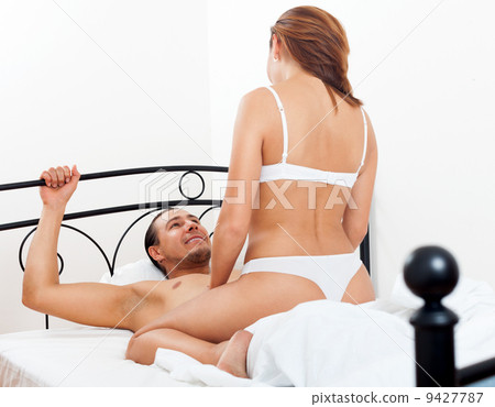 Couple Having Sex On Bed