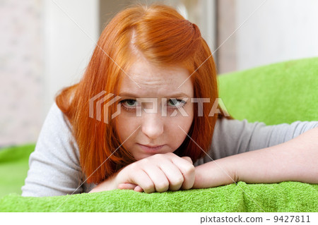 Red-haired sadness girl Red-haired sadness girl 9427811