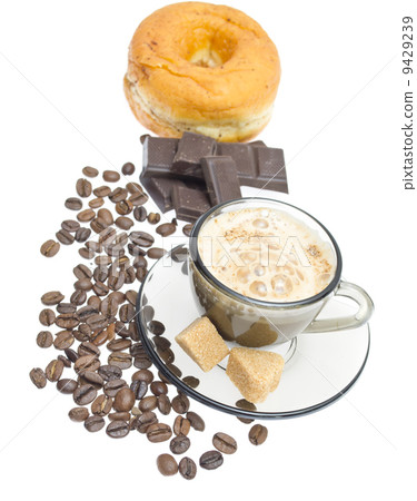 Cappuccino, brown sugar and coffee beans on white background 9429239