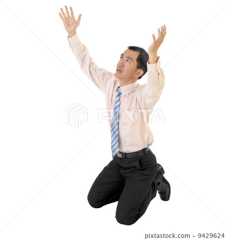 Mature business man begging 9429624