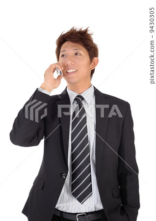 Young entrepreneur talking on phone 9430305