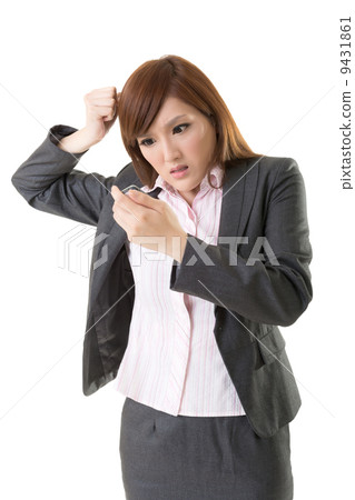 Angry businesswoman talk on phone 9431861