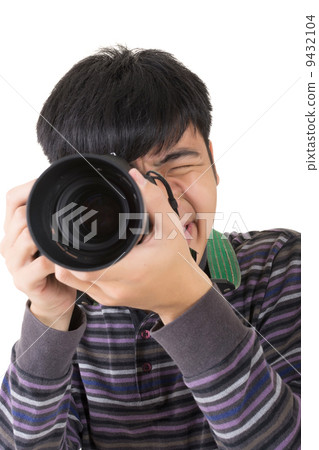 Young amateur photographer 9432104