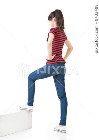 Full legth portrait of asian woman on stairs 9432489