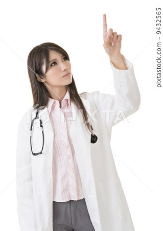 Medical doctor woman with stethoscope and finger point Medical doctor woman with stethoscope and finger point 9432565