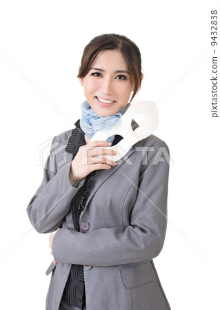 Asian business woman holding a mask Asian business woman holding a mask 9432838