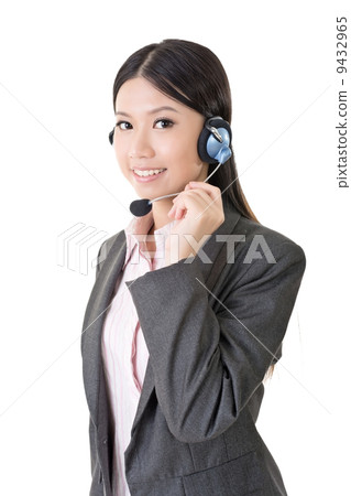 Cheerful female customer support phone operator Cheerful female customer support phone operator 9432965