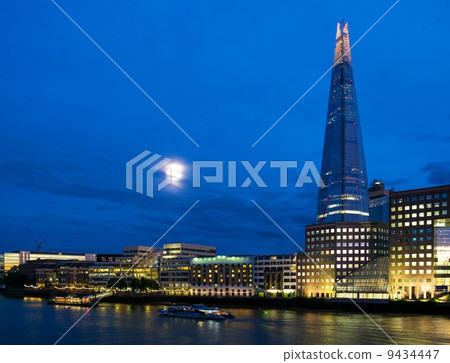 Illuminated The Shard skyscraper at night in London, England 9434447