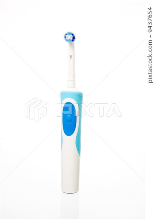 Electric toothbrush isolated on a white background Electric toothbrush isolated on a white background 9437654