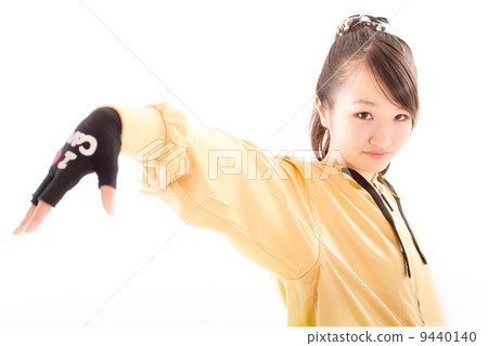 A pretty cheerful girl who dances hip-hop dance 9440140