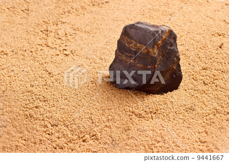 stone in the sand texture 9441667