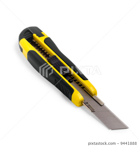 yellow stationery knife on a white background yellow stationery knife on a white background 9441888