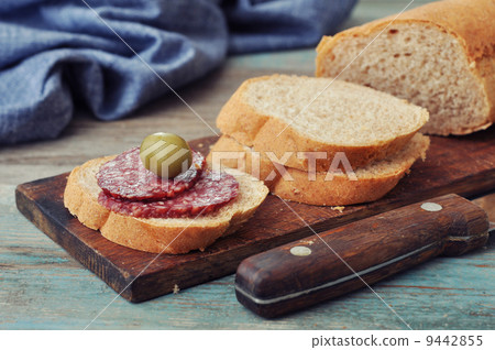 Sliced baguette with salami Sliced baguette with salami 9442855