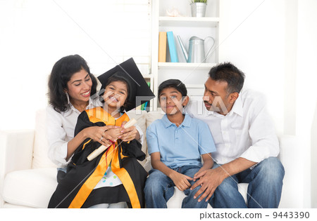 Happy indian family graduation, education concept photo 9443390