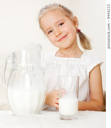Child with glass pitcher milk Child with glass pitcher milk 9444215
