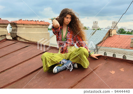 Girl on a roof 9444440