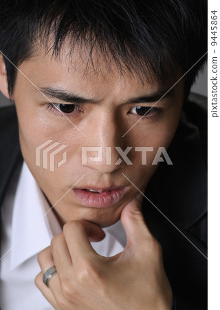 Worried young business man Worried young business man 9445864