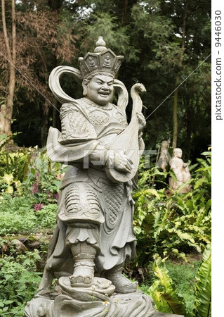 Aged asian god statue 9446030