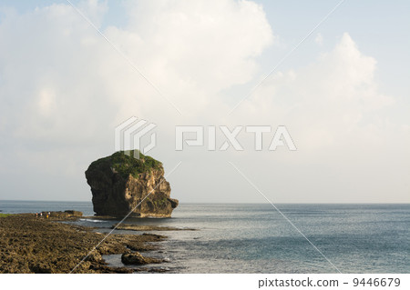 Chuanfan Rock at coastline 9446679