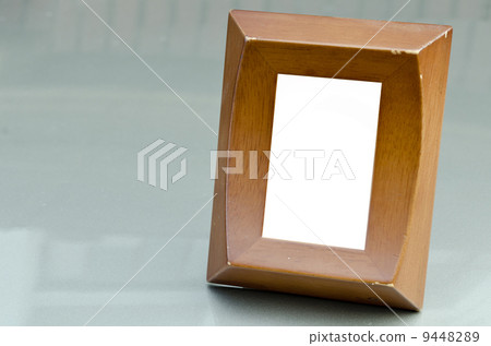 antique wood picture frames  on metal background. 9448289