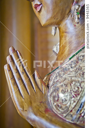 wood handmade.Sculptures in the temple. Thai style  acting Wai ( 9448365