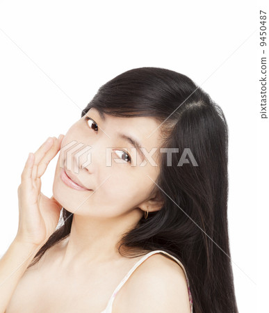 smiling asian woman's face 9450487