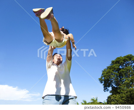 happy father and daughter with blue sky background happy father and daughter with blue sky background 9450986