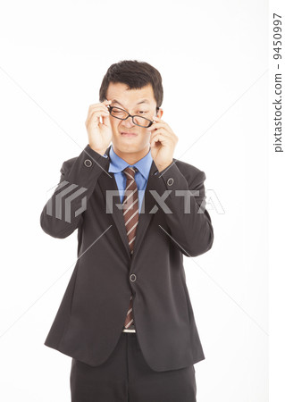 confused businessman with glasses confused businessman with glasses 9450997