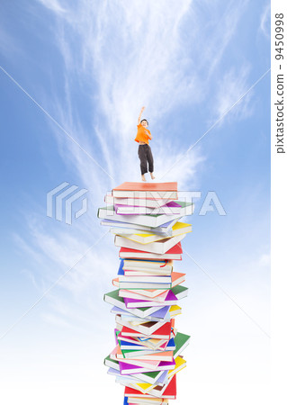 happy kid jumping on the books happy kid jumping on the books 9450998