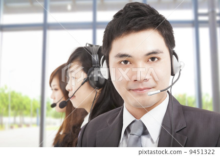 smart asian businessman with call center agent 9451322